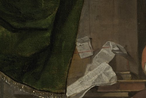 Detalle de la carta sujetada en el tablero del fondo...