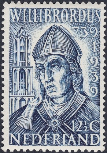 Países Bajos, 1939,  XII centenario de la muerte de San Willibrord. Viñeta que representa a Willibrord como obispo de Utrecht, con la Torre Dom al fondo. Diseño y grabado de Hubert Levigne. Calcografía