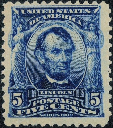 Estados Unidos, 1903, Abraham Lincoln. Diseño de Raymond Ostrander Smith. Retrato y figuras laterales grabados por Baldwin. Robert Ponickau incidió el resto del marco y Lyman F. Ellis, las letras y cifras