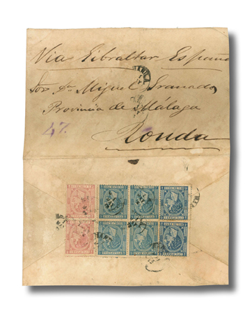 Philippines, 1878 (1 May) envelope (opened out for display) from Manila to Ronda, Spain &quot;Via Gibraltar&quot; bearing on reverse 1875-77 King Alfonso XII 2c. rose and 10c. blue vertical pairs and 1878-79 King Alfonso XII 125m. block of four tied by &quot;Manila/*&quot; c.d.s., reduced at sides, fine and scarce mixed franking of the centavos and milesimas issues, 74 centavos (740 miliesimas) for a 6-weight letter to Spain. Scott 52, 55, 68.
