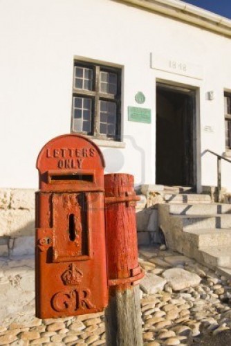 4107859-a-historical-mailbox-at-the-lighthouse-in-cape-aghullas-dating-back-to-the-1800-s-and-bearing-the-cr.jpg