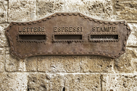 stock-photo-vintage-rusty-iron-mail-box-on-stone-wall-at-venice-in-italy-47498962.jpg