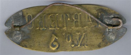 Chapa identificativa. Cartero. N.º 1 Reverso. Baja.jpg