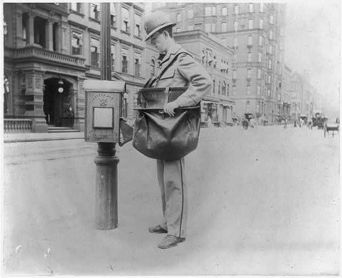 c1896 New York City Postman at letter box.jpg
